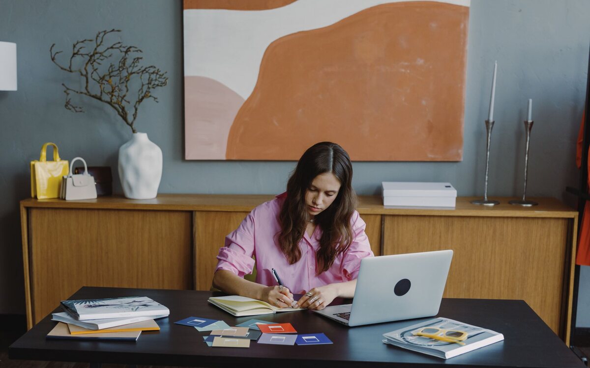 Woman working on a laptop at home